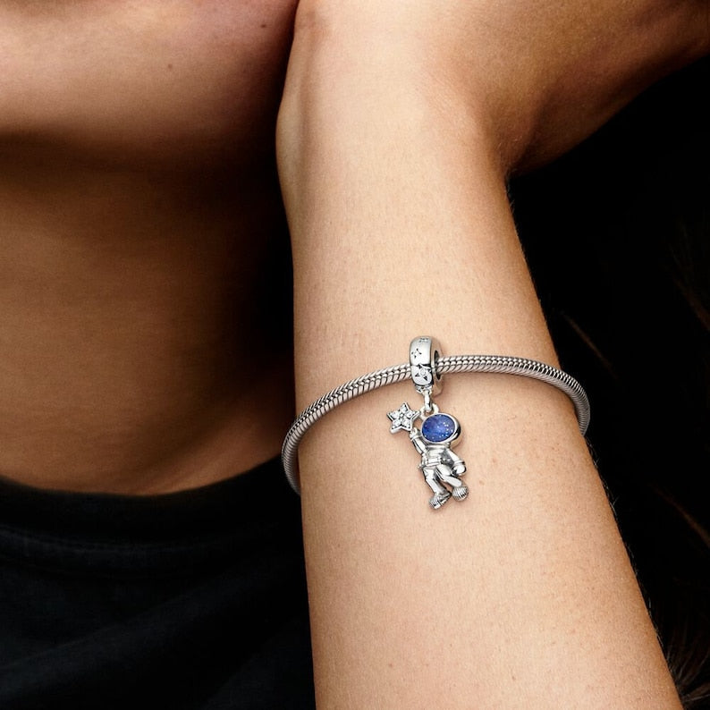 Astronaut in the galaxy dangle charm
